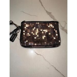 1546. Coach Sequined Wristlet